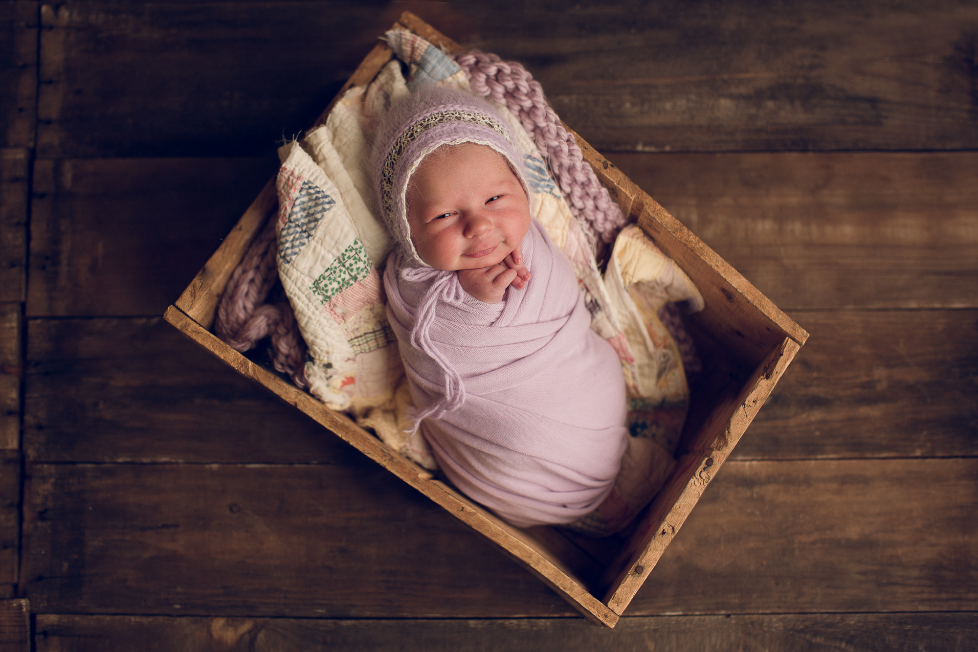 Adelaide Newborn photographer photo of a newborn baby.