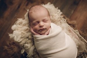 Adelaide Newborn photographer photo of a newborn baby.