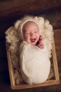 Adelaide Newborn photographer photo of a newborn baby.