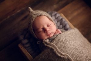 Adelaide Newborn photographer photo of a newborn baby.