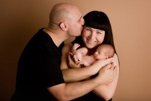 Adelaide newborn baby photographer's photo of a newborn baby with their family.