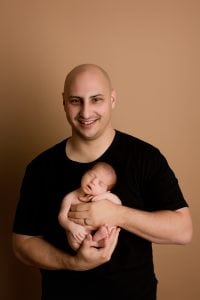 Adelaide newborn baby photographer's photo of a newborn baby with their family.