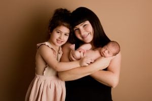 Adelaide newborn baby photographer's photo of a newborn baby with their family.