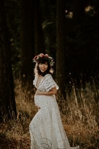 Adelaide maternity photographer's photo of a pregnant woman in a white dress.