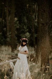 Adelaide maternity photographer's photo of a pregnant woman in a white dress.