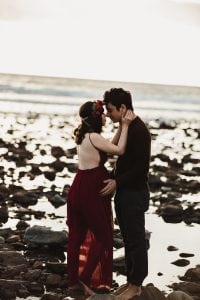 Adelaide maternity photograph of a pregnant mother in a red dress.