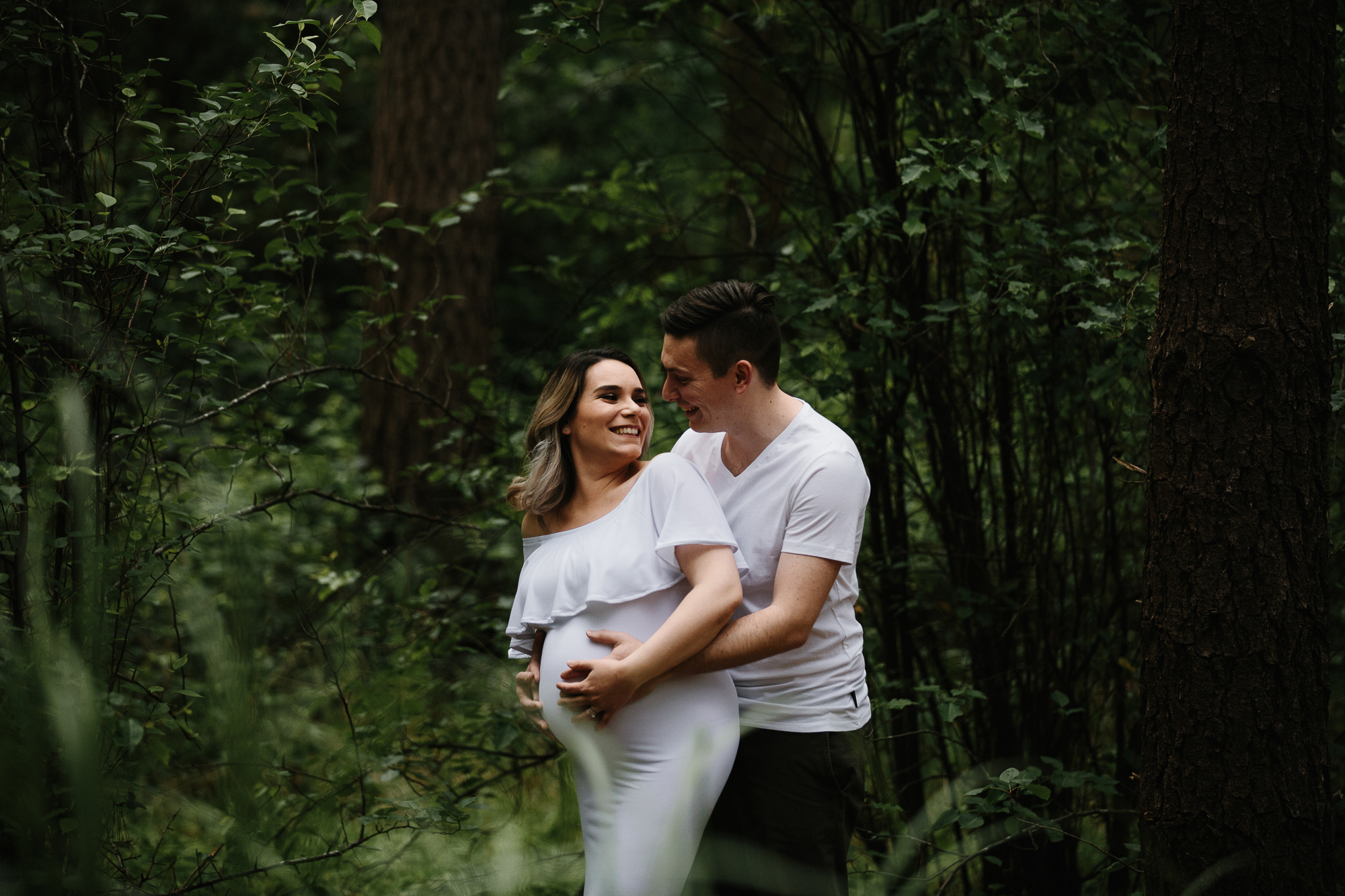 Adelaide maternity photographer's photo of a pregnant mother in a white dress.