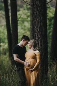 Adelaide maternity photographer's photo of a pregnant mother in a mustard dress.