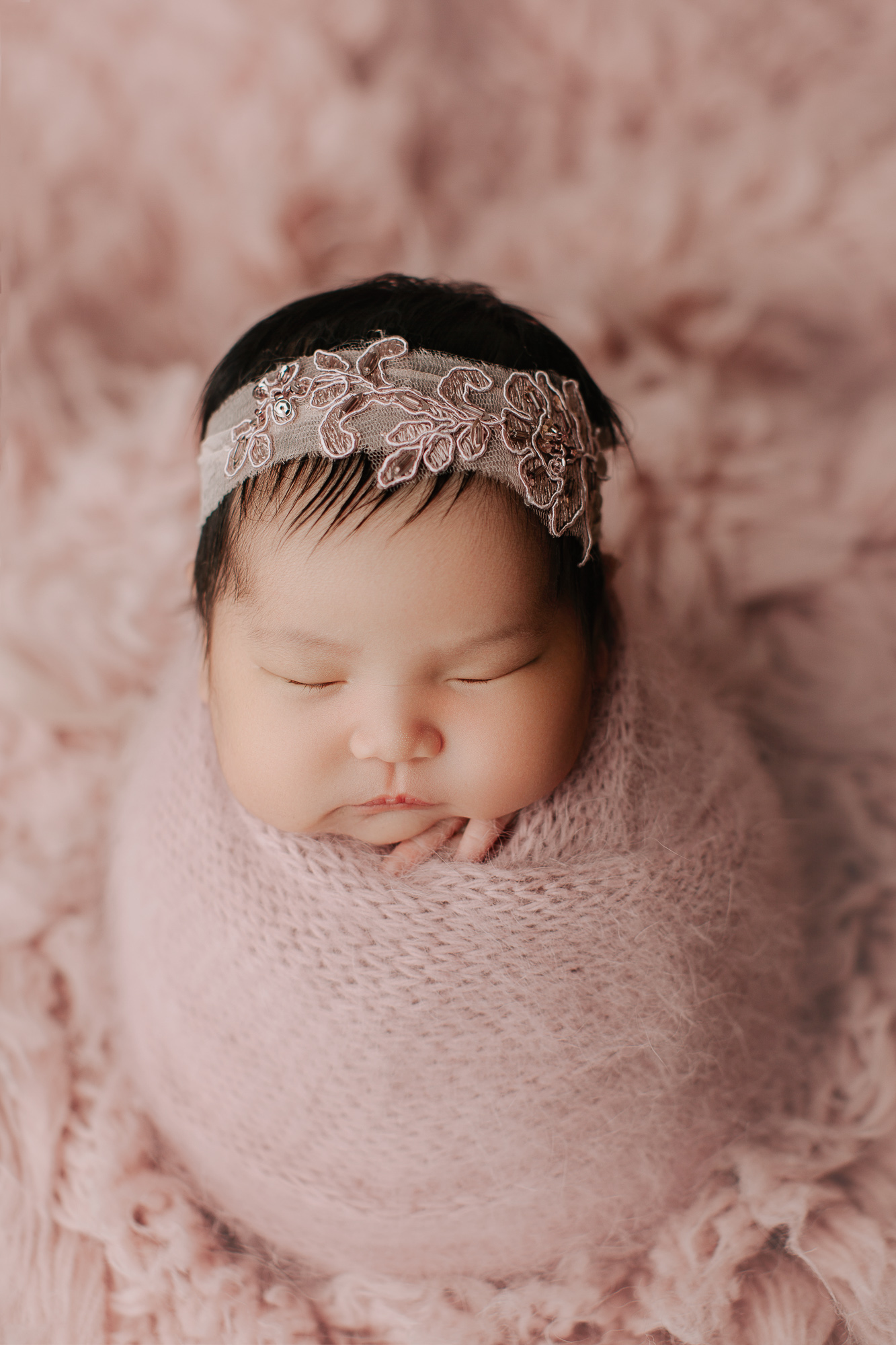 Adelaide newborn baby photographer's photo of a newborn baby girl.