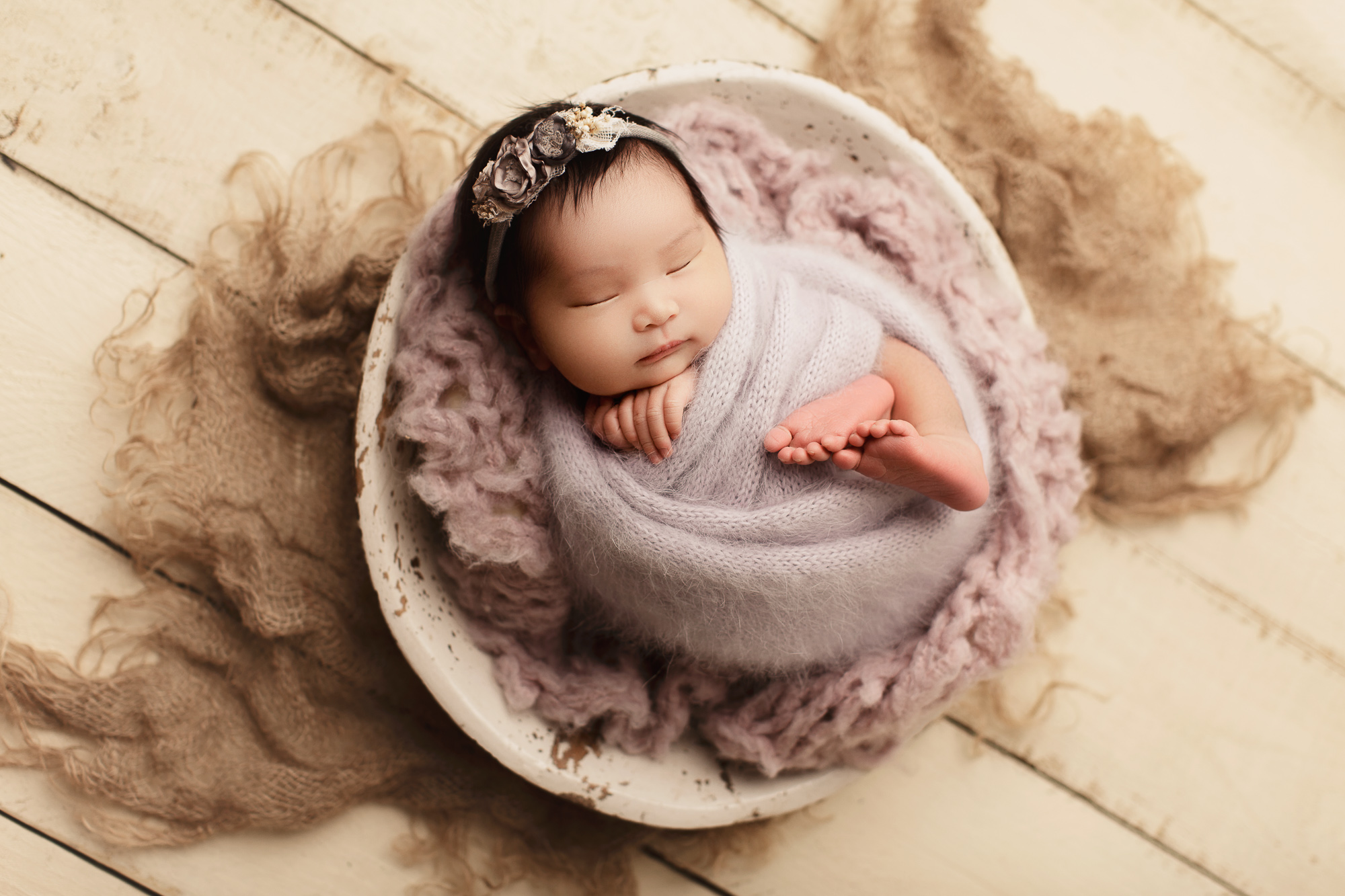 Adelaide newborn baby photographer's photo of a newborn baby girl.